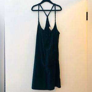 Black tunic with braided detail along collar. Perfect closet staple!